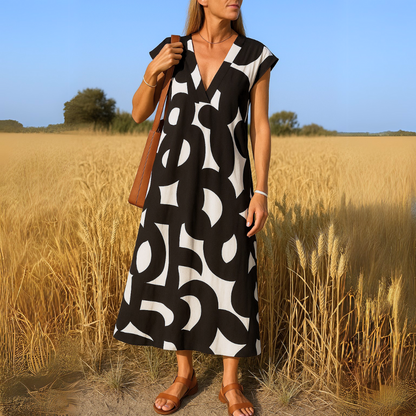 Tirzah - Flowing V-Neck Geometric Print Dress